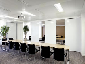 Sliding Folding Timber Partition System, Suspended Ceiling and Conference Desking and Chairs.